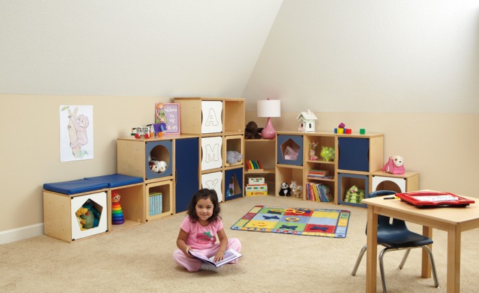 A perfectplay room.com Clean palette natural wood and navy storage units Attic style