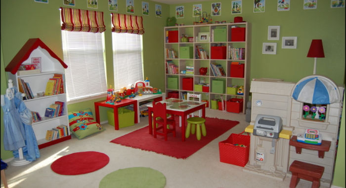 Avocado green and apple red child's playroom with blue accents