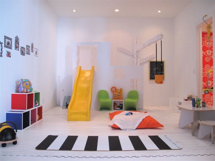 Little boy's traditional playroom yellow slide zebra pedestrian crossing rug on white