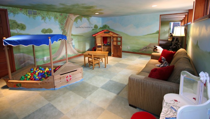 Magical hillside child's playroom with adult spaces and tree mural