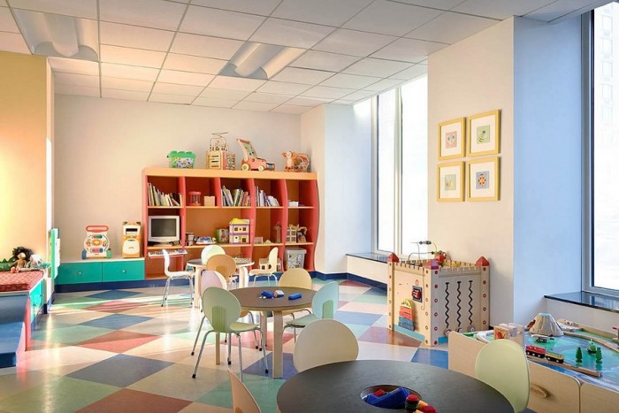 Pretty pastel child's playroom large open-plan