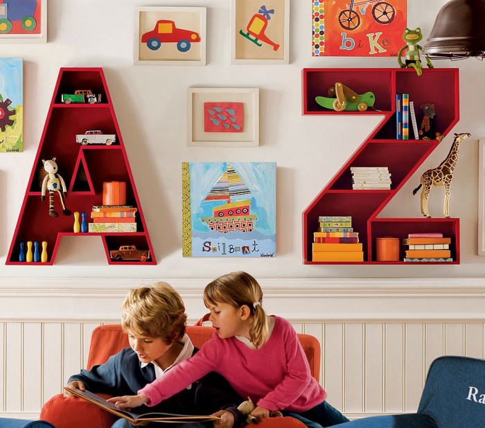 Quirky alphabet storage units child's white playroom