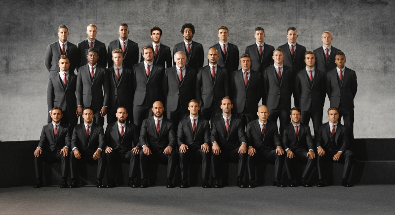 Các cầu thủ và ban điều hành CLB bóng đá Bayern Munich trong trang phục suit bảnh bao được thiết kế bởi Giorgio Armani. 