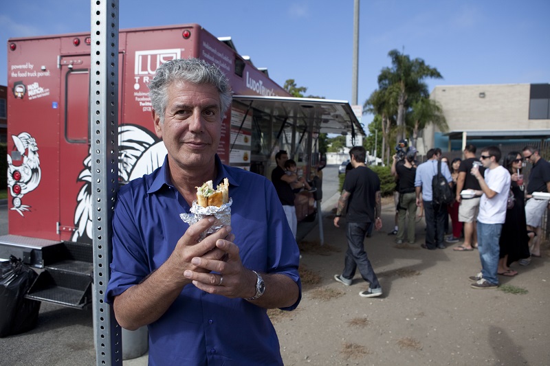 SANTA MONICA, CALIFORNIA, AUGUST 07 2011: Layover host Anthony Bourdain at the fried achicken at Ludo Truck's Guerilla Chicken, a fried chicken food truck trendy with foodies and started by renowed French chef Ludo Levfvre (photo Gilles Mingasson for The Travel Channel).