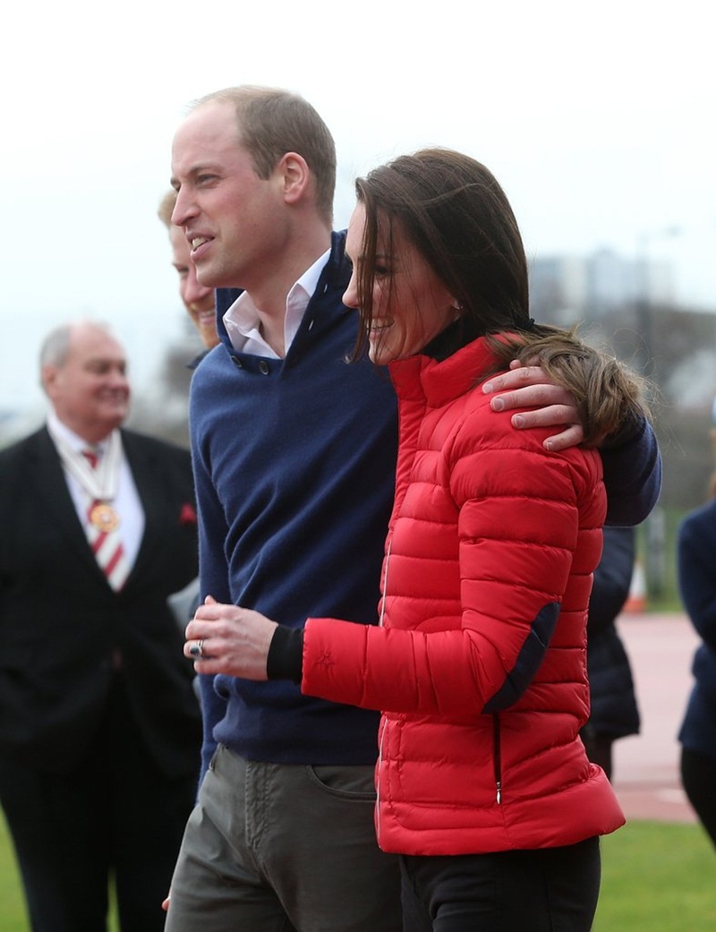 Will kept his hand around Kate during a training day for the Heads Together running team in February 2017.