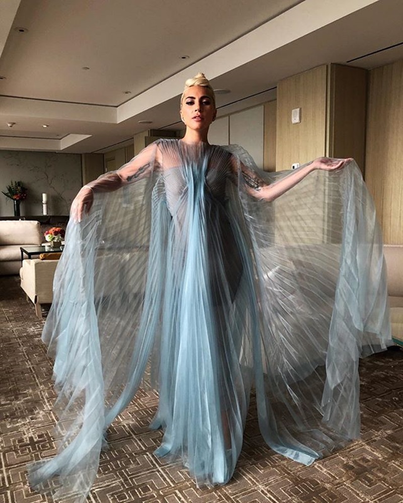 Lady Gaga's design creates the feeling of ocean waves with azure tones.