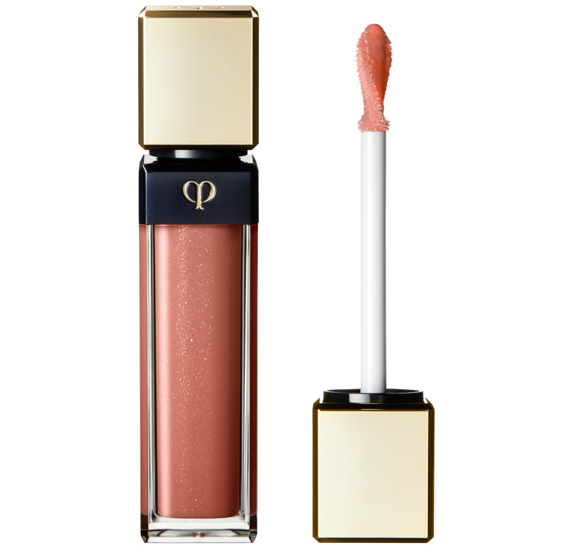 Clé De Peau Beauté Radiant Lip Gloss màu Warm Crystal: Son bóng có khả năng giữ ẩm, nuôi dưỡng bờ môi nhờ chiết xuất dầu argan. Thiết kế đầu son uốn lượn mềm mại thuận tiện tiếp xúc với mọi góc cạnh trên đôi môi