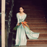 Bella Mai thả dáng thướt tha trong tà áo dài truyền thống trong bộ ảnh theo phong cách Sài Gòn thập niên 90